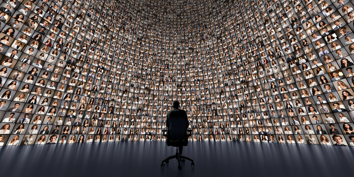 Curved video wall, surround a seated man