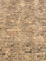Tan colored brick wall background 