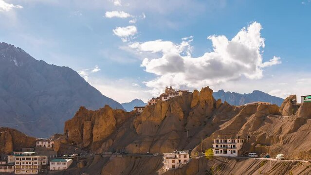 4K Time lapse shot of the clouds above Dhankar Monastery during the day at Spiti Valley in Himachal Pradesh, India. Clouds move above the monastery against the blue sky. Natural background.