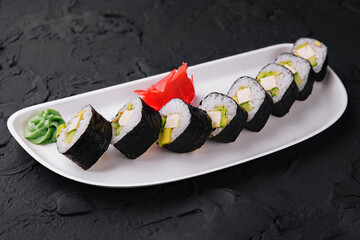 Sushi with Feta Cheese and Avocado on White Plate
