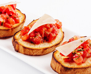 Traditional italian antipasto bruschetta appetizer with cherry tomatoes