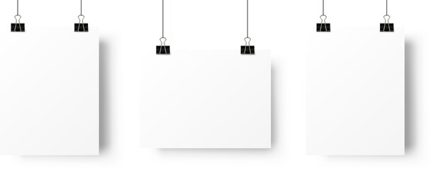 A4 paper page blank posters hanging on paperclip. Realistic mockup  - obrazy, fototapety, plakaty