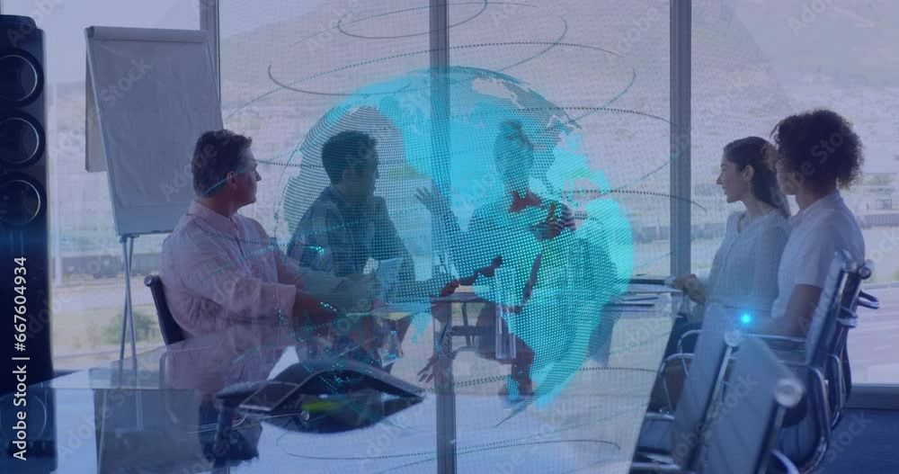 Canvas Prints Animation of spinning globe against group of diverse businesspeople discussing together at office