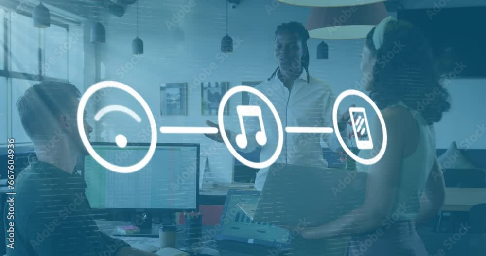 Wall mural Animation of network of digital icons against group of diverse colleagues discussing at office