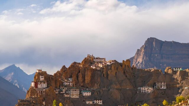 4K Time-lapse shot of Dhankar Monastery during evening at Dhankar in Spiti Valley, Himachal Pradesh, India. Clouds move behind the Dhankar gompa during the sunset. Beautiful monastery background. 