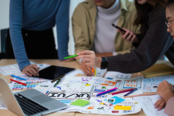 Close up ux developer and ui designer use augmented reality brainstorming about mobile app...