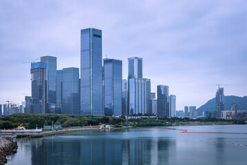 The harbor scenery of Baoan District, Shenzhen, china. City skyline at dusk. Modern business office building.
