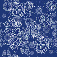 White snowflakes on dark blue seamless background. Holiday paper. Seamless background for design of fabrics, wrapping paper and wallpaper. Vector illustration.