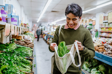 Man buying fresh produce at supermarket