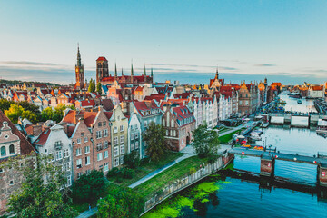 A magical image of Gdańsk at sunset. Urban landscape. Beautiful Main Town with old tenement houses. © Kamil