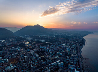 Naklejka premium Sunrise over Alanya Beach from a drone, Turkish Riviera on Mediterranean Coast, Antalya, Turkey