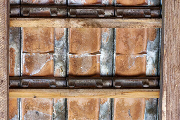 Close-up of clay tiles of roof of barn at Swiss Cit of Zürich. Photo taken October 22nd, 2023, Zurich, Switzerland.
