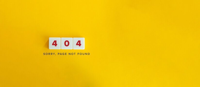 404 error page not found concept. Block letters on bright orange background.