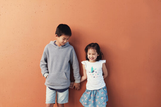 Happy multicultural boy and girl
