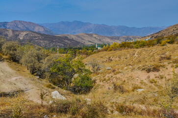 rocky trail on the slopes of Chimgan mountain (Bostanliq district, Tashkent region, Uzbekistan)