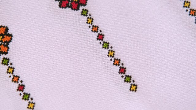 Slavic cross stitch by colored threads. Design of ethnic pattern with Embroidery