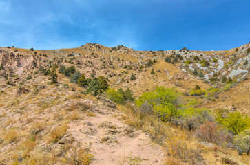 Fototapeta na wymiar scenic view from Sandy Pass trail in Chimgan mountains (Bostanliq district, Tashkent region, Uzbekistan)