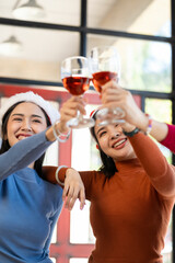 Group of Asian female friends at a party Have a fun time together. pizza party wine drinks Celebrating an important moment