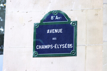 Historic plaque indicating the Avenue des Champs-Elysées. Paris, France 
