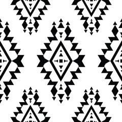 Seamless repeat geometric ethnic pattern. Aztec and Navajo tribal abstract vector style in black and white colors. Design for fabric, textile, ornament, printing, interior, rug.