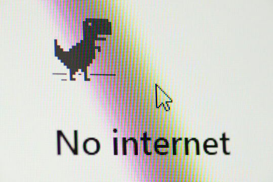 Chernihiv, Ukraine - January 12, 2022: Game of dinosaur and inscription No internet on screen of computer. Concept of no access to the internet