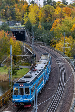 Stockholm, Sweden  A Stockholm Tunelbana or Metro train on outdoor tracks in the