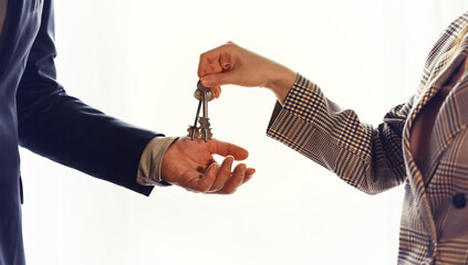 Businessman and woman shake hands as hello in office closeup. Friend welcome, introduction, greet or thanks gesture, product advertisement, partnership approval, arm, strike a bargain on deal concept