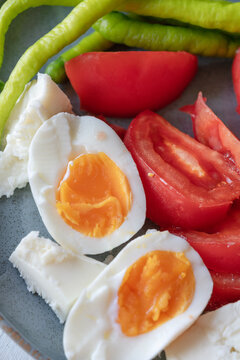 boiled eggs with salad on plate for breakfast