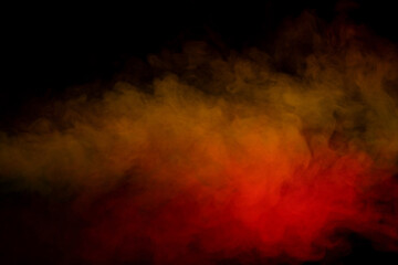 Fototapeta premium Orange and red steam on a black background.