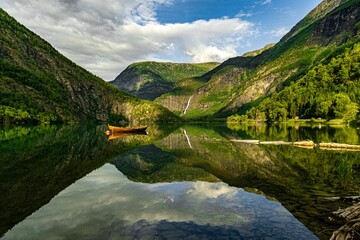 Scenic view of mountains reflecting on Eidsvatnet lake in Skjolden, Norway