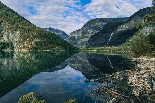 Scenic view of mountains reflecting on Eidsvatnet lake in Skjolden, Norway