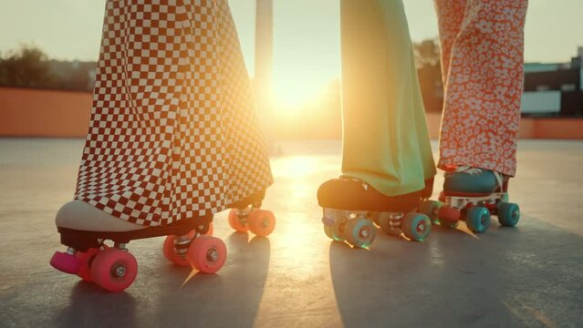 Females in quad roller skates doing back and forth movements