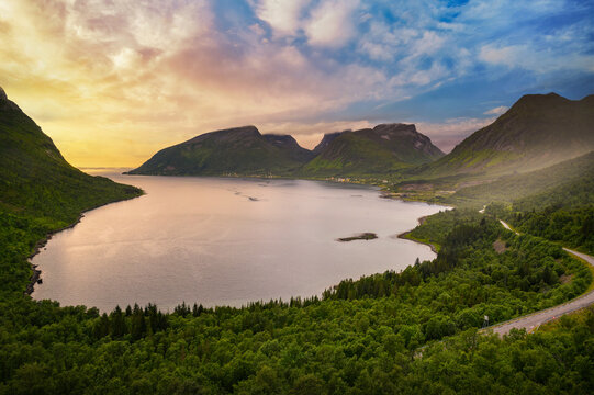 Colorful sunset at fjord Bergsbotn. Bergsbotn is a fjord arm, a village and a district on Senja Island in northern Norway.