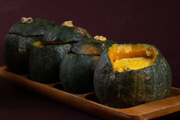 Jerked beef or biltong or dried meat broth in pumpkin, a brazilian dish.