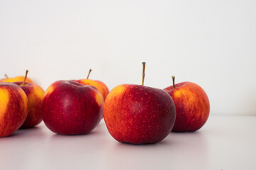 Group of yellow red apples. Organic fresh fruits and image of autumn harvest