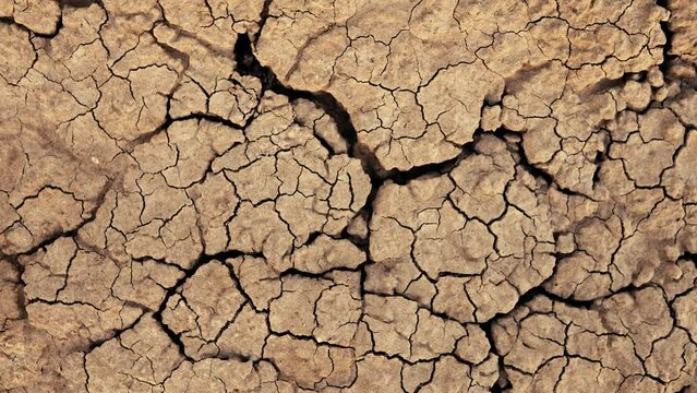 Earthquake, cracked ground begins to shake