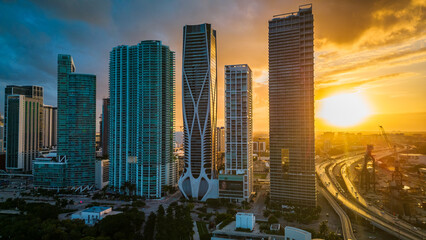 Miami downtown at sunset aerial view of modern skyscraper buildings smart city  - obrazy, fototapety, plakaty