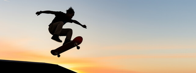 man jumping with his skateboard on a ramp in a skate park, dynamic silhouette  in extreme jump pose on a blue sky at sunset, panoramic banner  