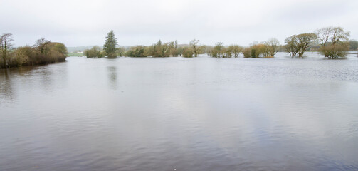 River Burst Banks Flooding Fields
