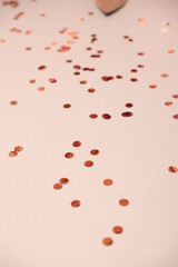pink round confetti on a white background