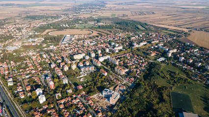 Aerial panorama of a European town at sunrise, with magnificent colorful sky and warm light, Pancevo Serbia.