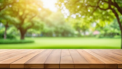 An empty wooden table with a blurry background of a lush green garden