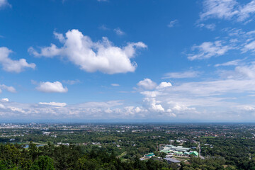View of city and green forest at Wat Phra That Doi Kham. Famous temple at  Chiang Mai Thailand
