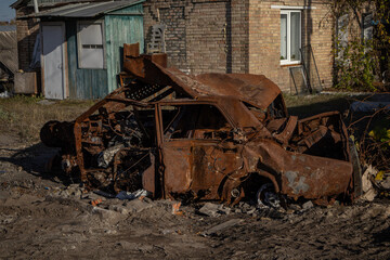 Fototapeta premium Irpin, Ukraine. 21.10.23 : burnt car in total