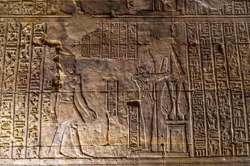 Detail of Egyptian inscriptions and paintings on Egyptian temples, ceilings and walls