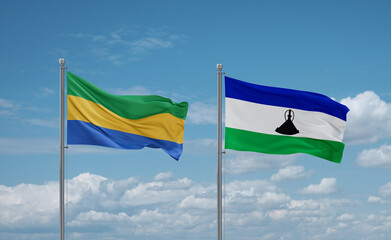 Lesotho and Gabon flags, country relationship concept