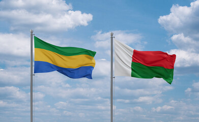 Madagascar and Gabon flags, country relationship concept