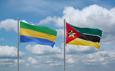 Mozambique and Gabon flags, country relationship concept