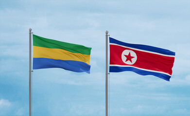 North Korea and Gabon flags, country relationship concept