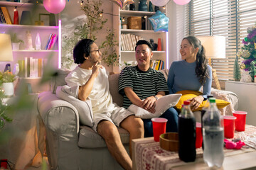 casual fun talk friend conversation group of cheerful party friend sit relax talking fun laugh cheerful on sofa in living room with party decorative house interior background